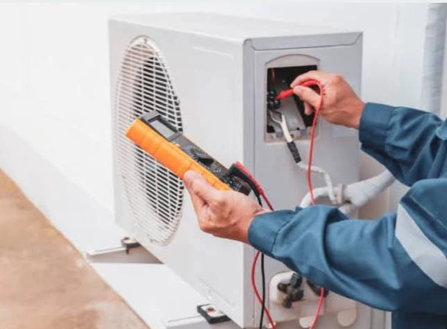 Electrical testing at the service panel of an outdoor air conditioner